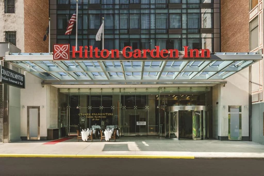 a hilton garden inn sign in front of a building at Hilton Garden Inn New York Times Square North in New York
