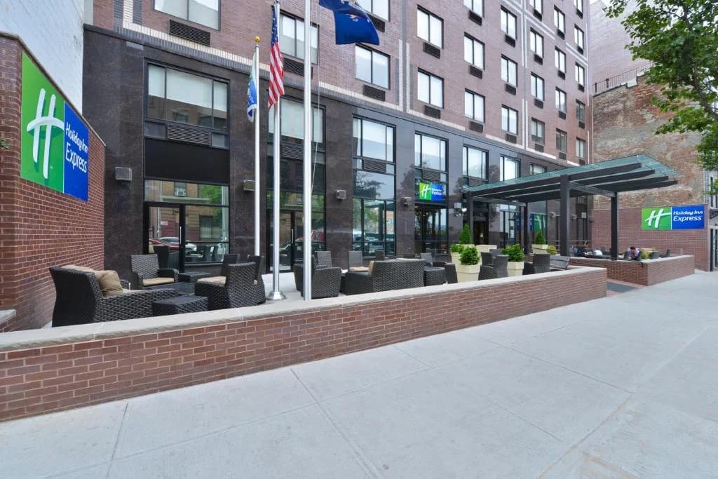 a seating area in front of a building at Holiday Inn Express Manhattan Midtown West by IHG in New York