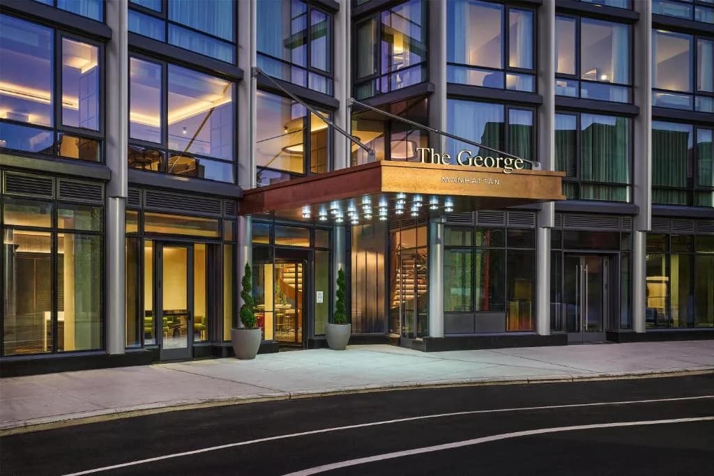 a building with a sign that reads the concourse at The George Manhattan, Tapestry Collection By Hilton in New York