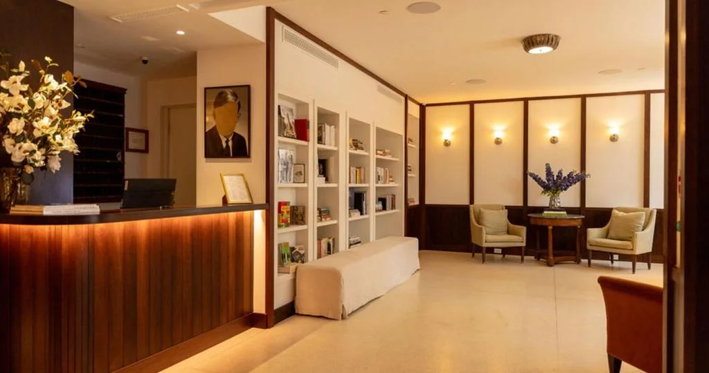 a lobby with a reception desk and a waiting room at West Village Eurohostel in New York