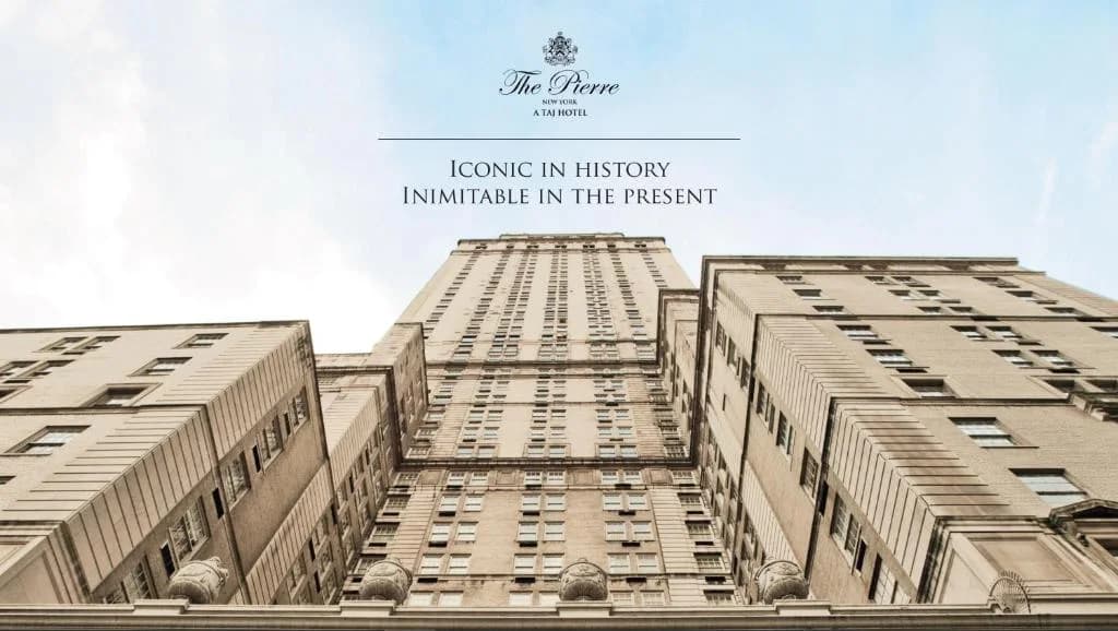 a view of two tall buildings with the words lounging in history insurance in at The Pierre, A Taj Hotel, New York in New York