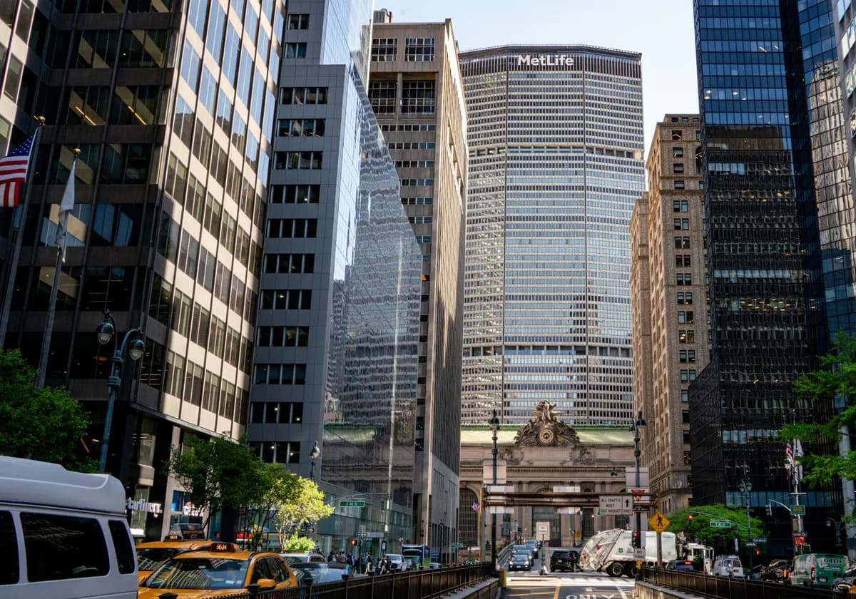 Dynamic view of Grand Central Terminal and MetLife Building in Manhattan, capturing urban life and architecture.