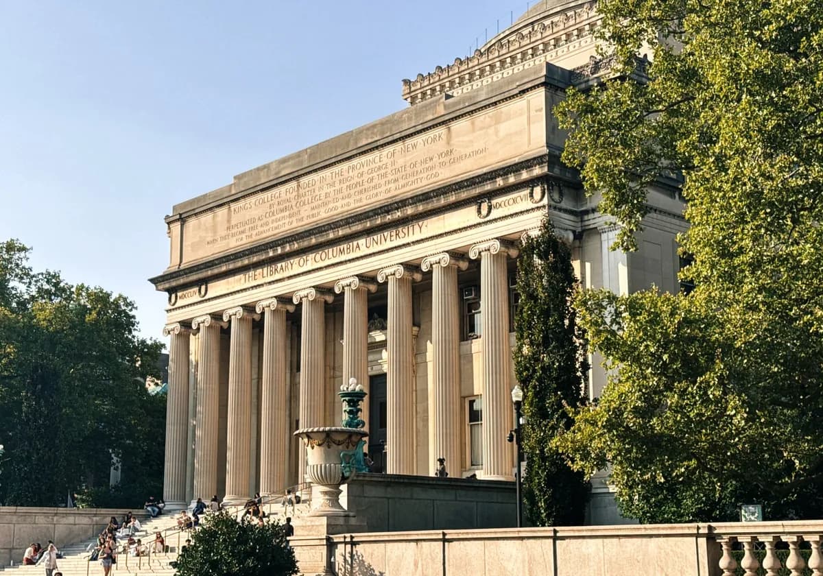 Historic Columbia University Library in a sunny outdoor setting.
