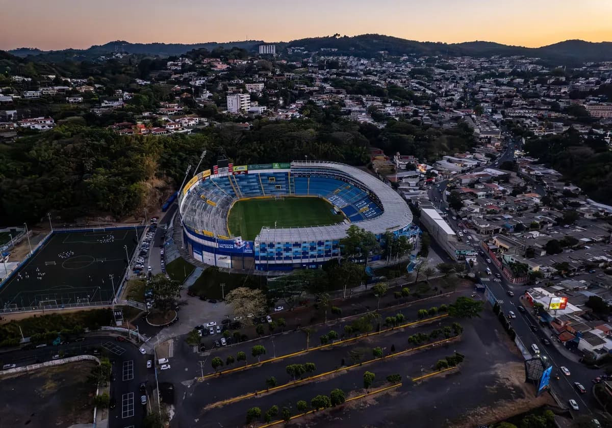 Aerial shot of Estadio Cuscatlán and surrounding area in San Salvador at sunset.