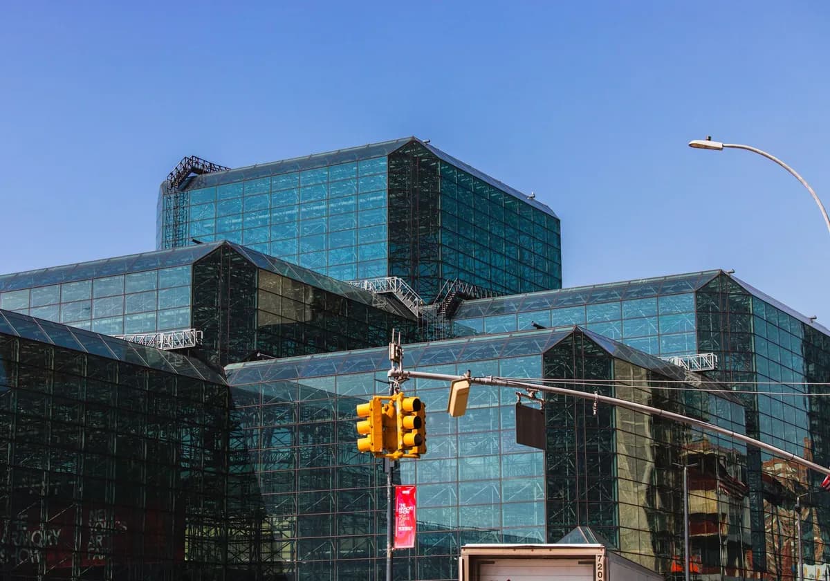 A striking view of the glass facade of the Javits Center in Manhattan, New York City.