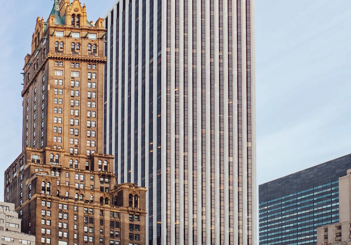 Captivating view of New York City skyscrapers, showcasing architectural contrasts.
