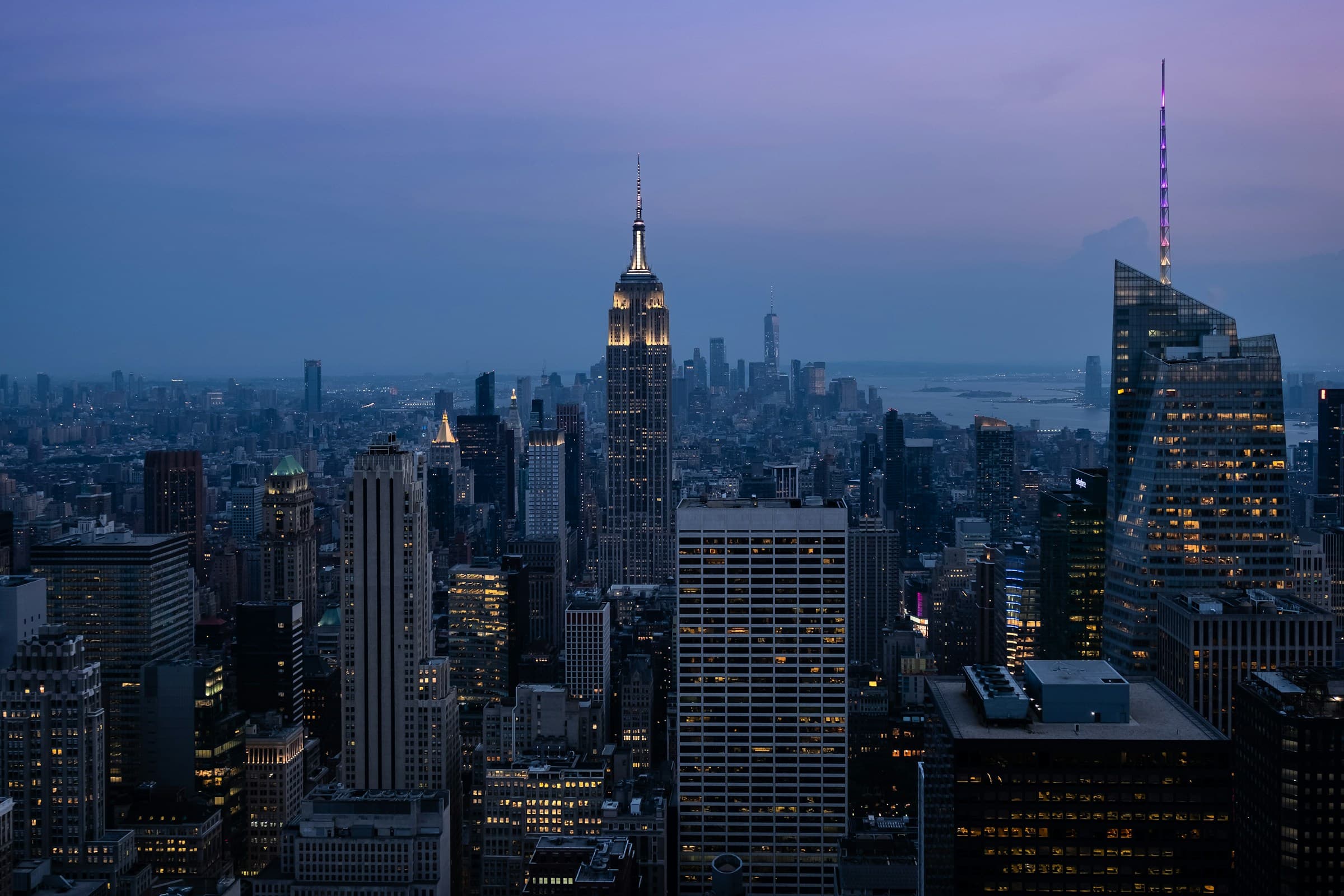 Aerial view of the Empire State Building and the Manhattan skyline at blue hour