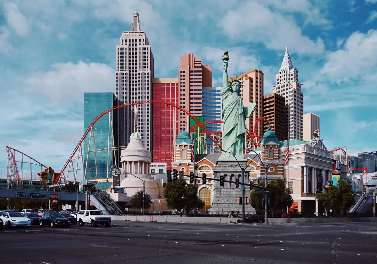 Colorful cityscape in Las Vegas featuring iconic replicas and vibrant architecture.